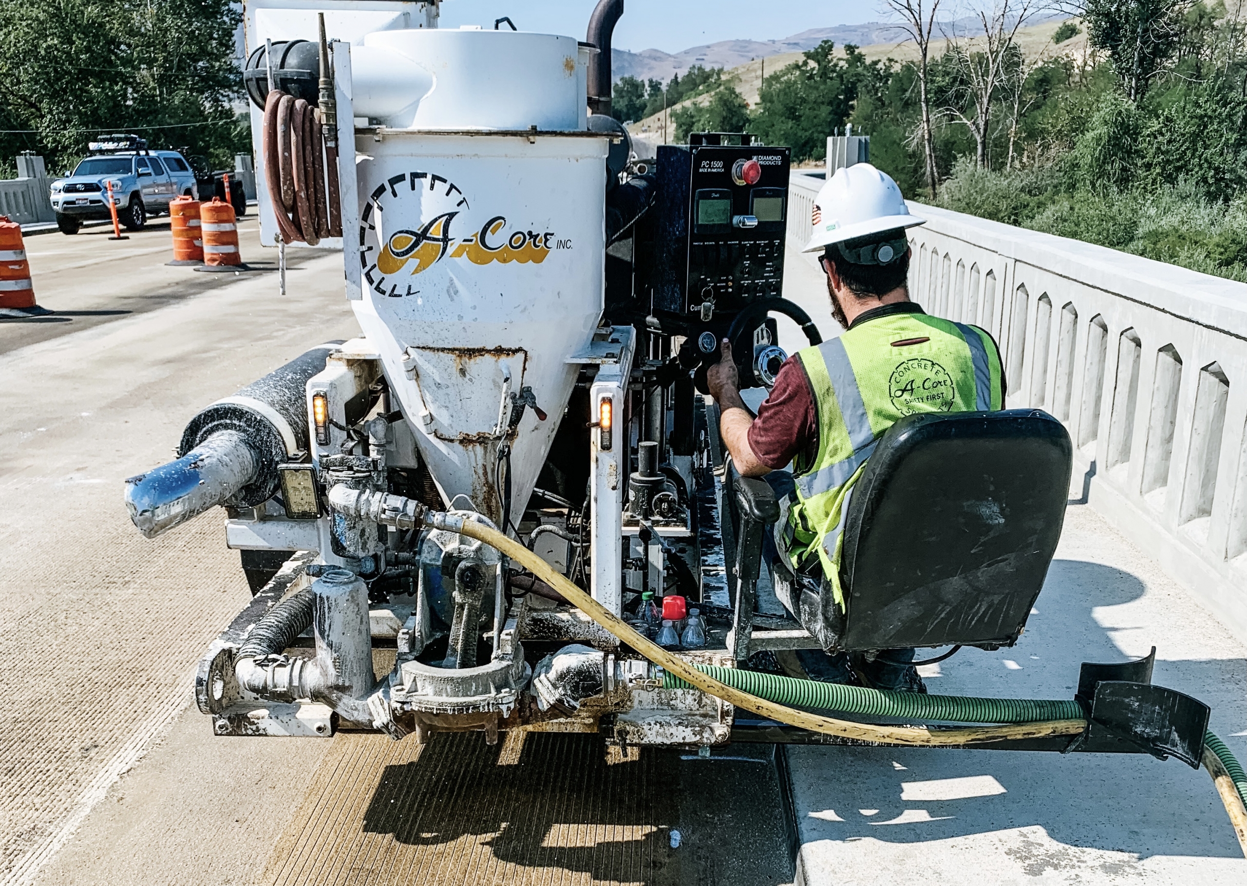 concrete specialist using the grinding and grooving machine on concrete